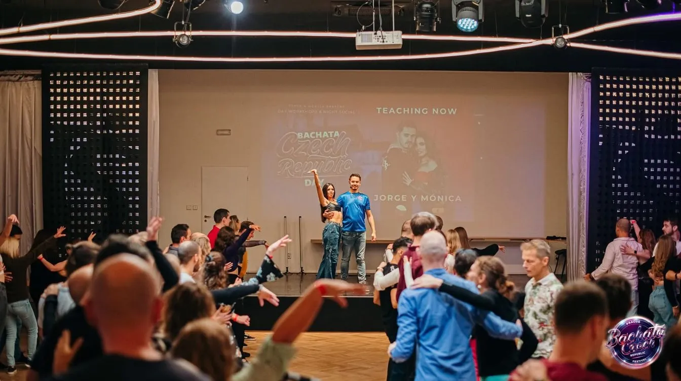 Jorge and Mónica teaching a bachata workshop to a full room of dancers at a Bachata Czech Republic event in Prague