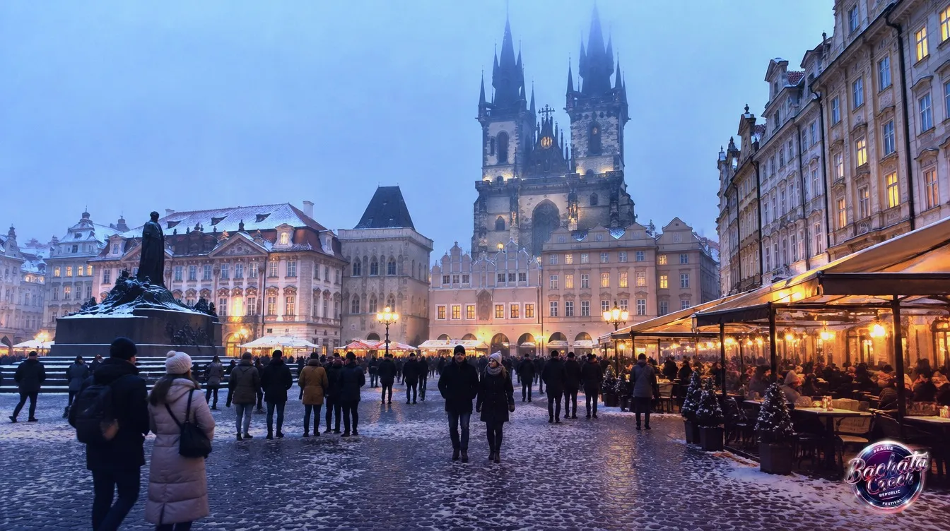 Old Town Square in Prague in late winter, light snow on the cobblestones and the Týn Church towers in mist